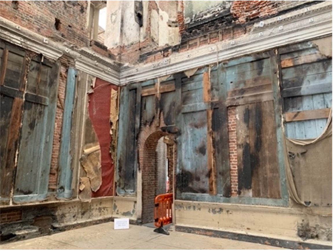 Clandon after the fire revealing early panelling 