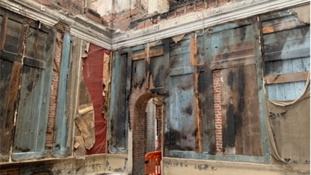 Clandon after the fire revealing early panelling 
